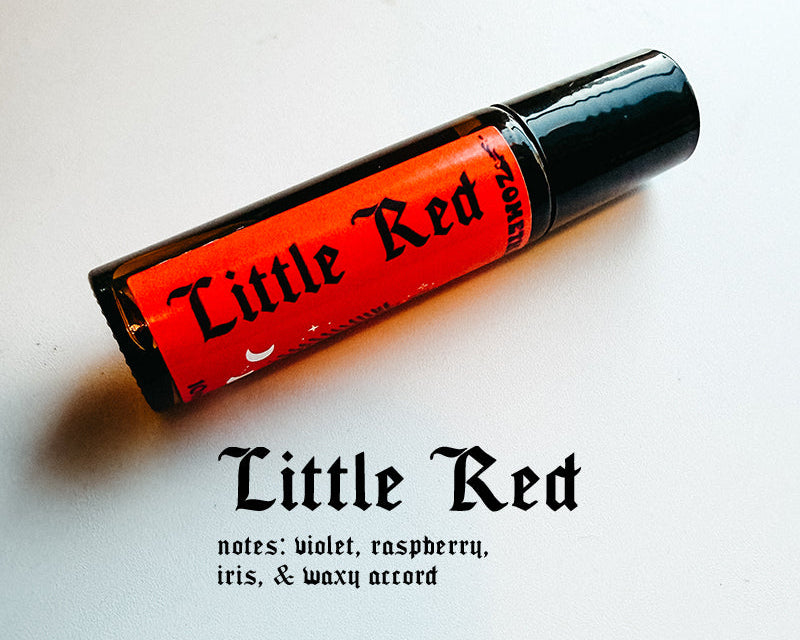 Roll-on bottle labeled 'Little Red' with red label and black text on a light background