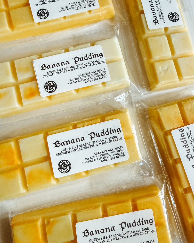 wax bars in yellow with clear labels naming Banana Pudding. 