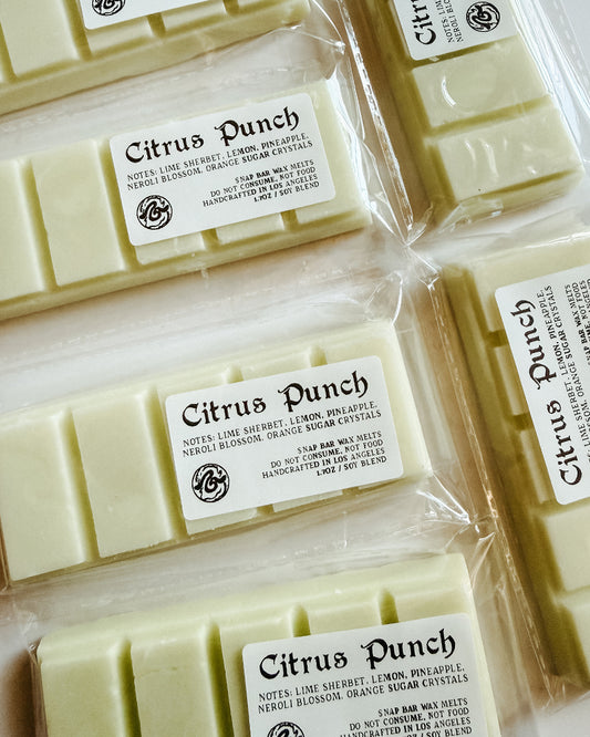 pale yellow wax melt bars with clear label. 