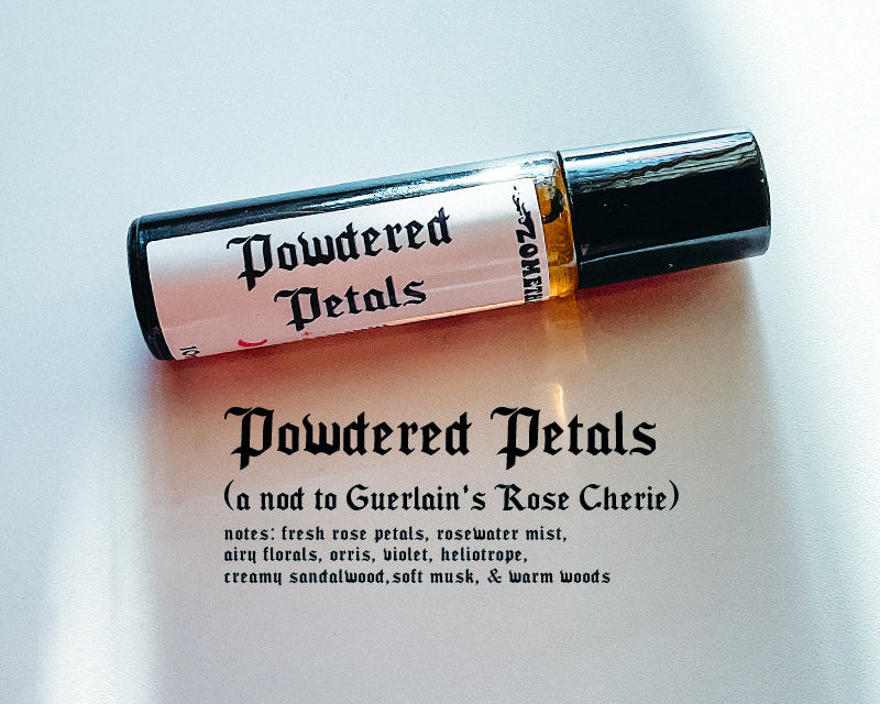 Roll-on bottle labeled 'Powdered Petals' on a light background